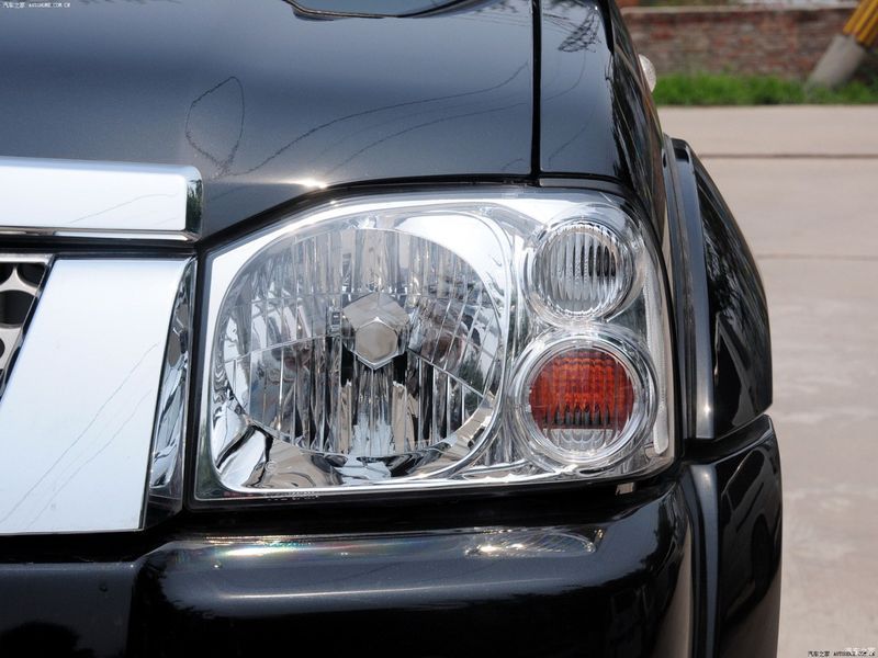 Скло фари для Nissan Paladin 2004-2015 ліве 2567882050 фото