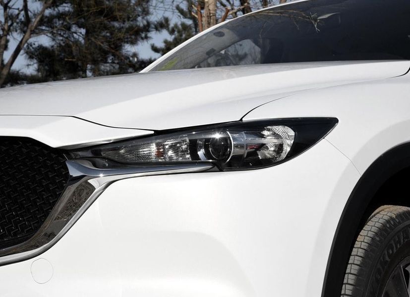Скло фари для Mazda CX-5 2016-2022 ліве 2568551600 фото