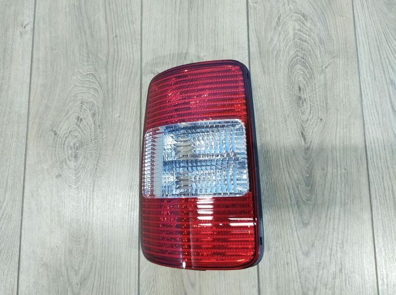 Фонарь задний левый для Volkswagen Caddy 2004-2010 1647338419 фото