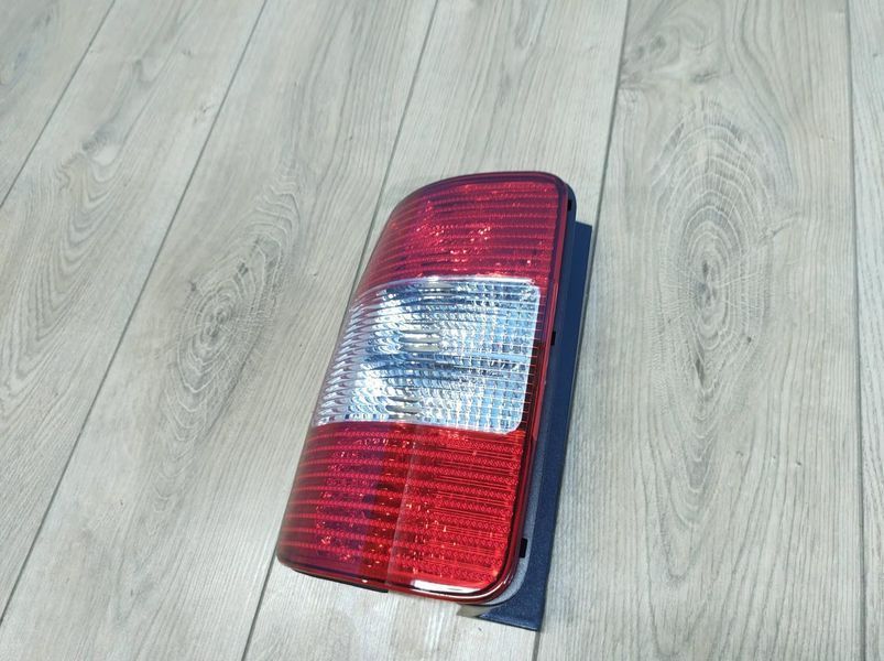 Фонарь задний левый для Volkswagen Caddy 2004-2010 1647338419 фото
